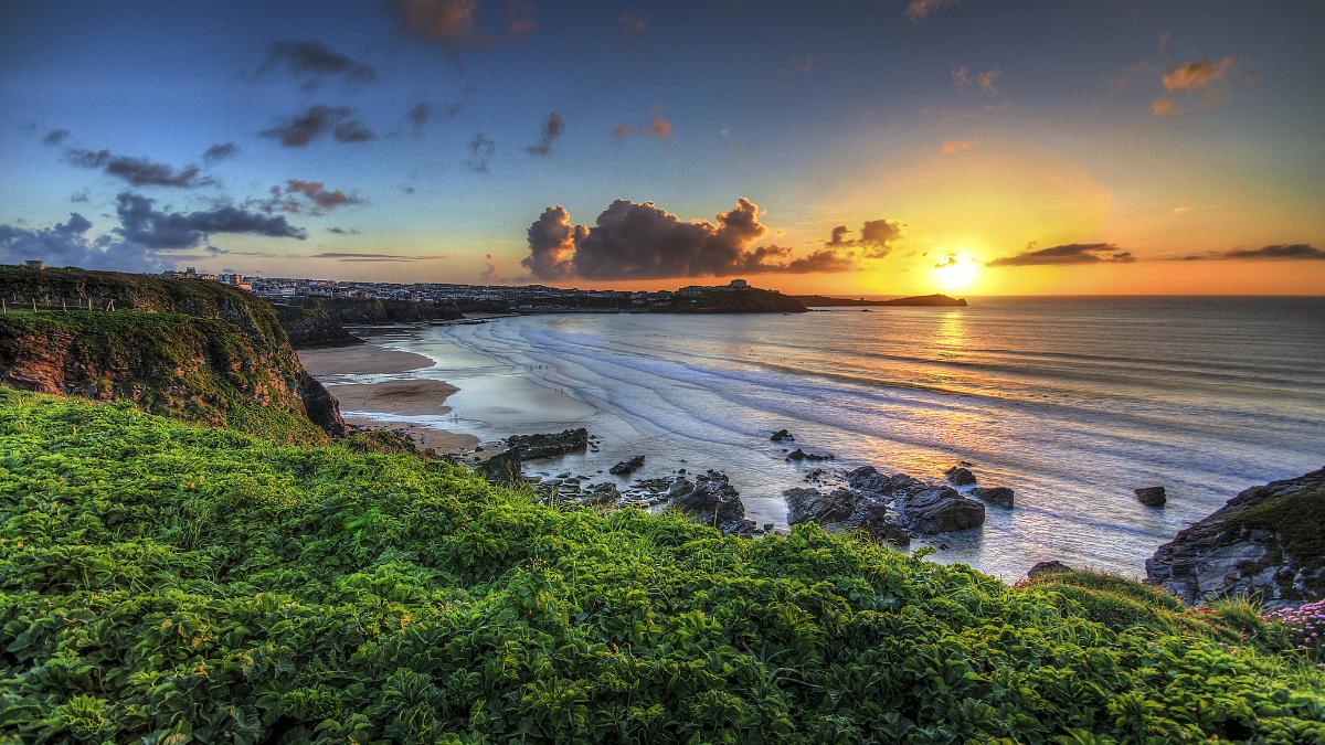 Sunset at Newquay, Cornwall - Best time for dolphin boat trips.